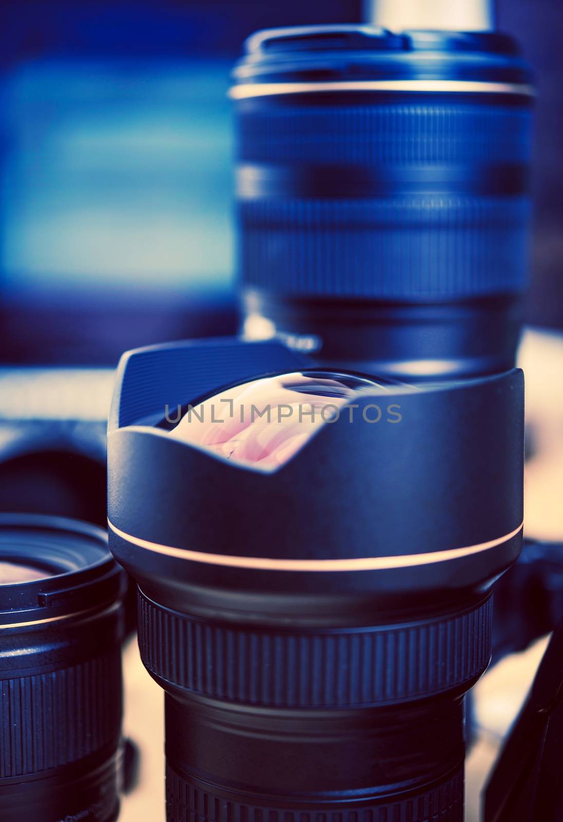 Professional Digital Camera Lenses Closeup. Photographer Gear. 