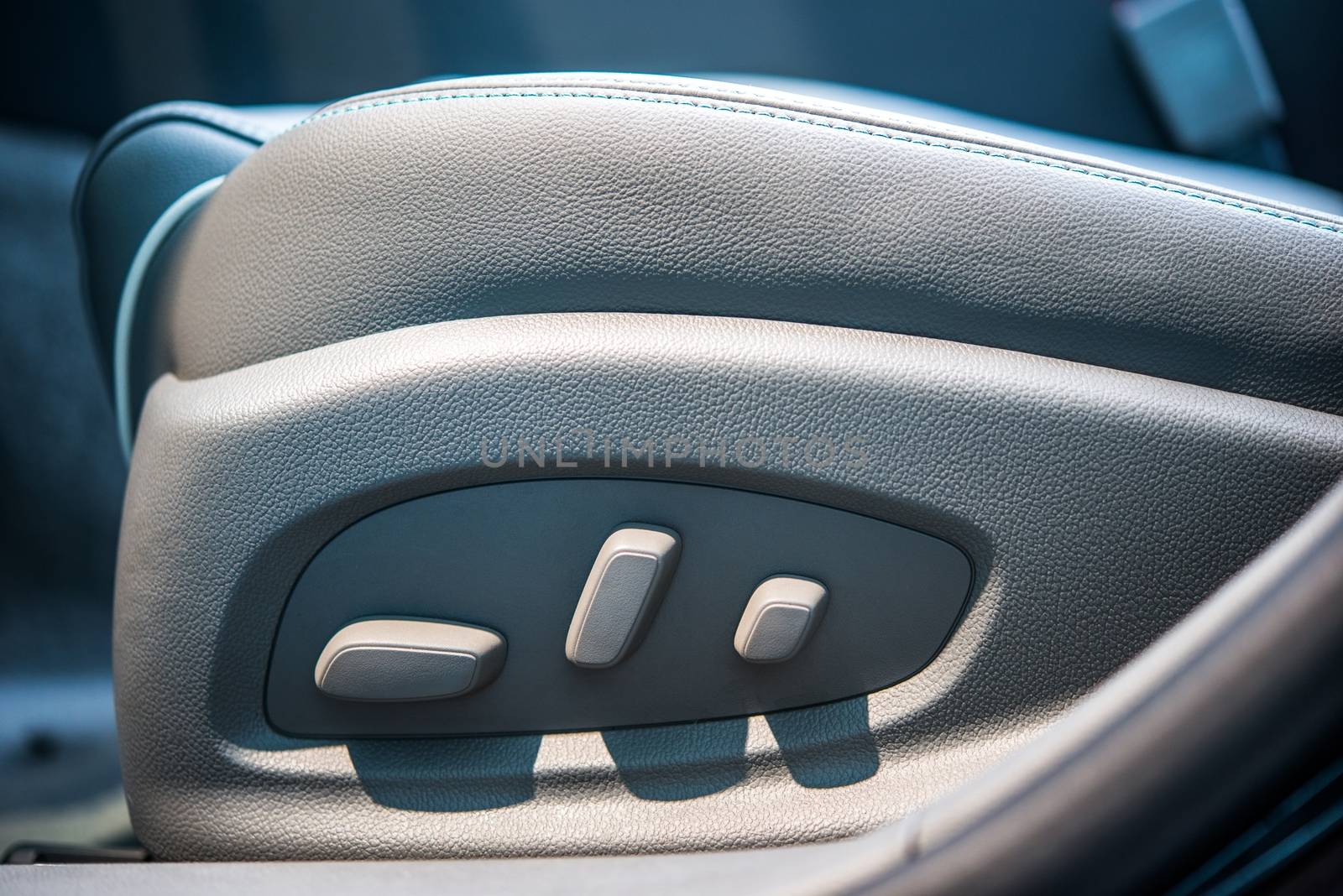 Power Seat in a Car. Leather Car Seat with Power Adjustments.