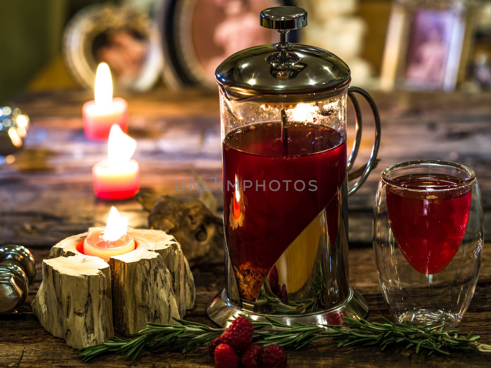 Red herbal and fruit tea in cup and tea pot