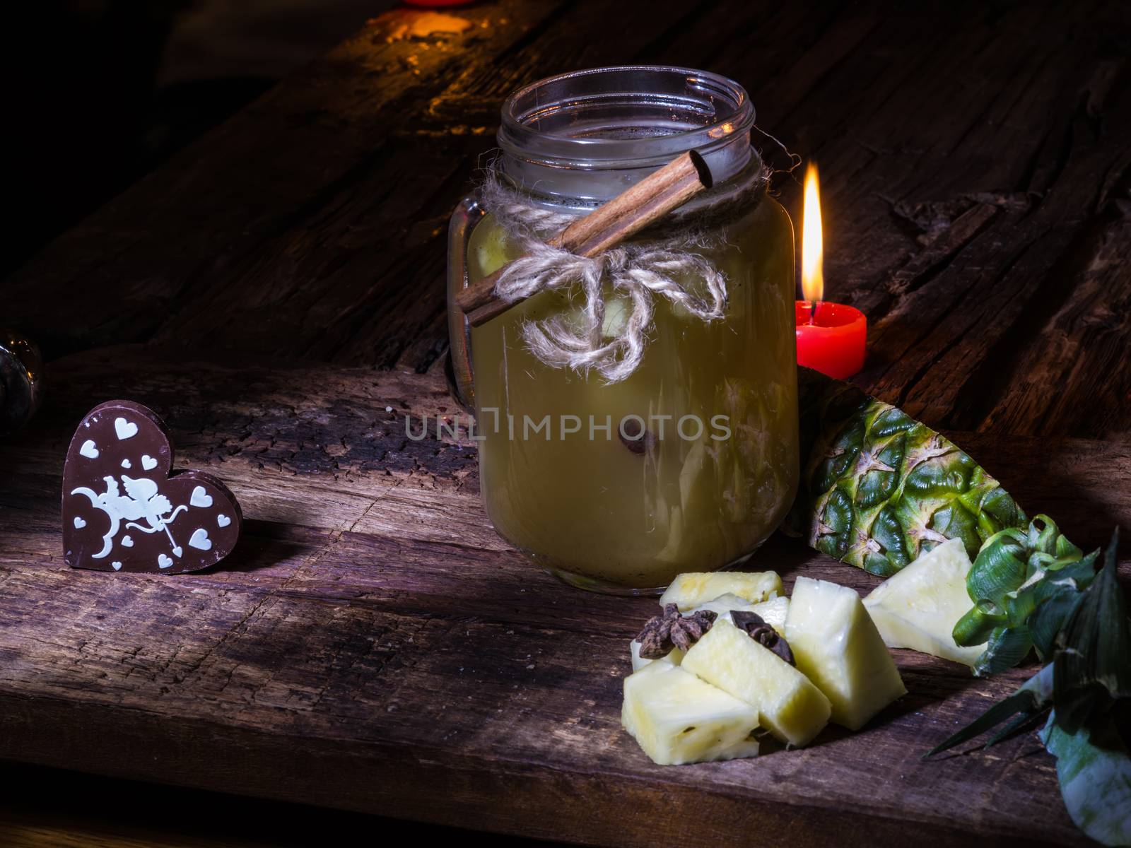 Concept green pineapple tea on wooden table