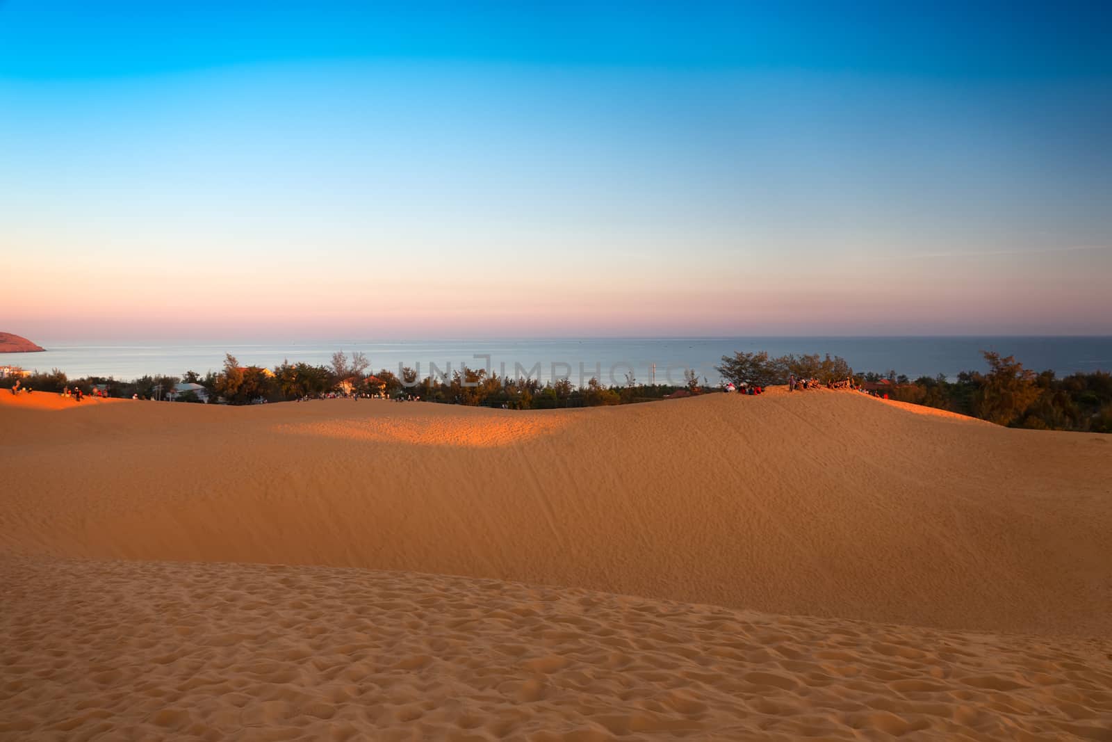 Red sand dunes in Mui Ne at sunset, Vietnam by fisfra