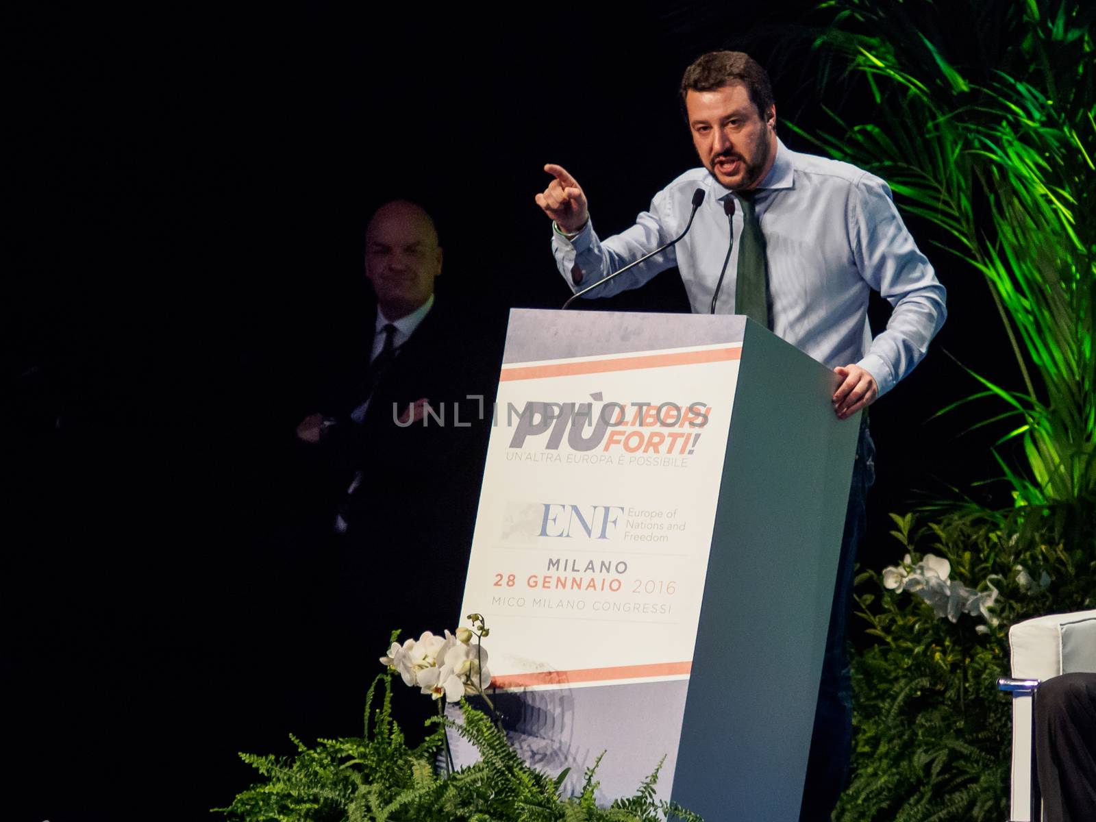 ITALY, Milan: Italian Secretary of the Northern League Matteo Salvini speaks during a political rally also attended by French President of the National Front Marine Le Pen and other officials at MiCo in Milan, Italy on January 28, 2016. At the same time, demonstrators from the Anti-Fascist Network of Milan march through the city and launch fireworks to protest their meeting.