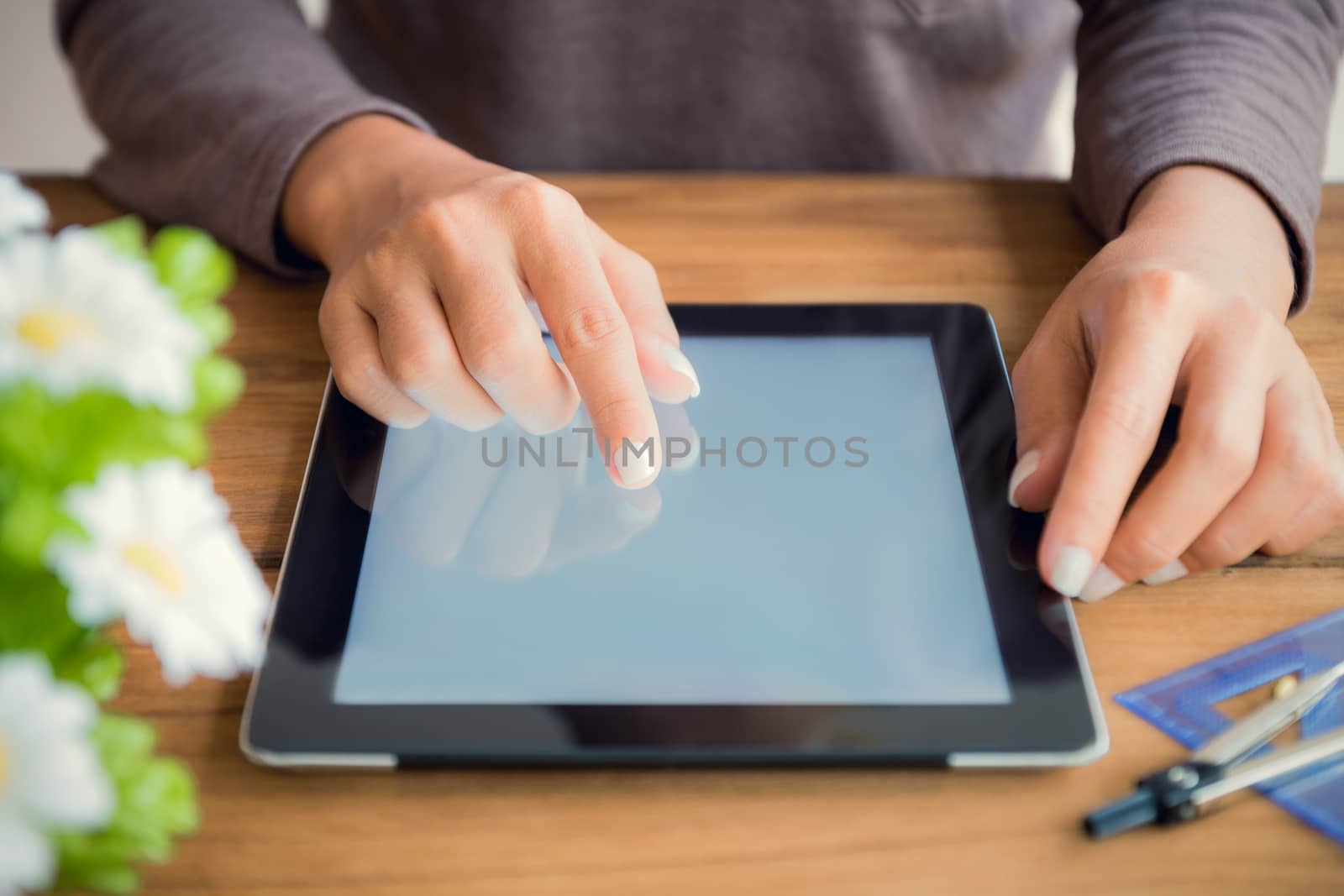 hand touch on tablet screen