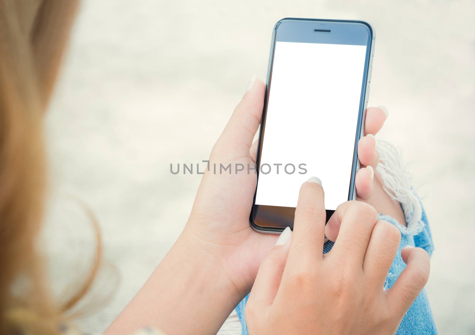 closeup women using phone from back view by blackzheep