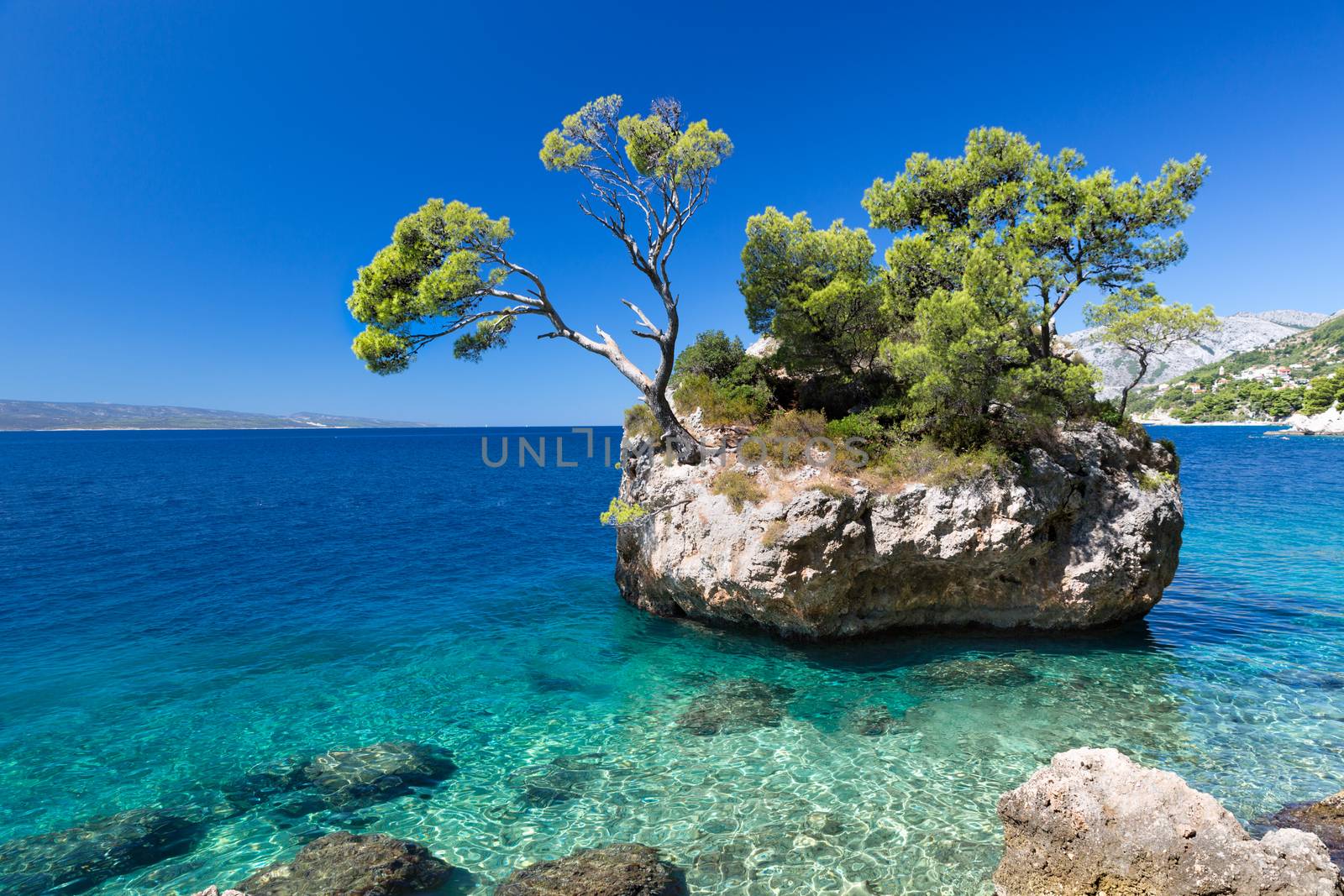 Croatian beach at a sunny day, Brela, Croatia by fisfra