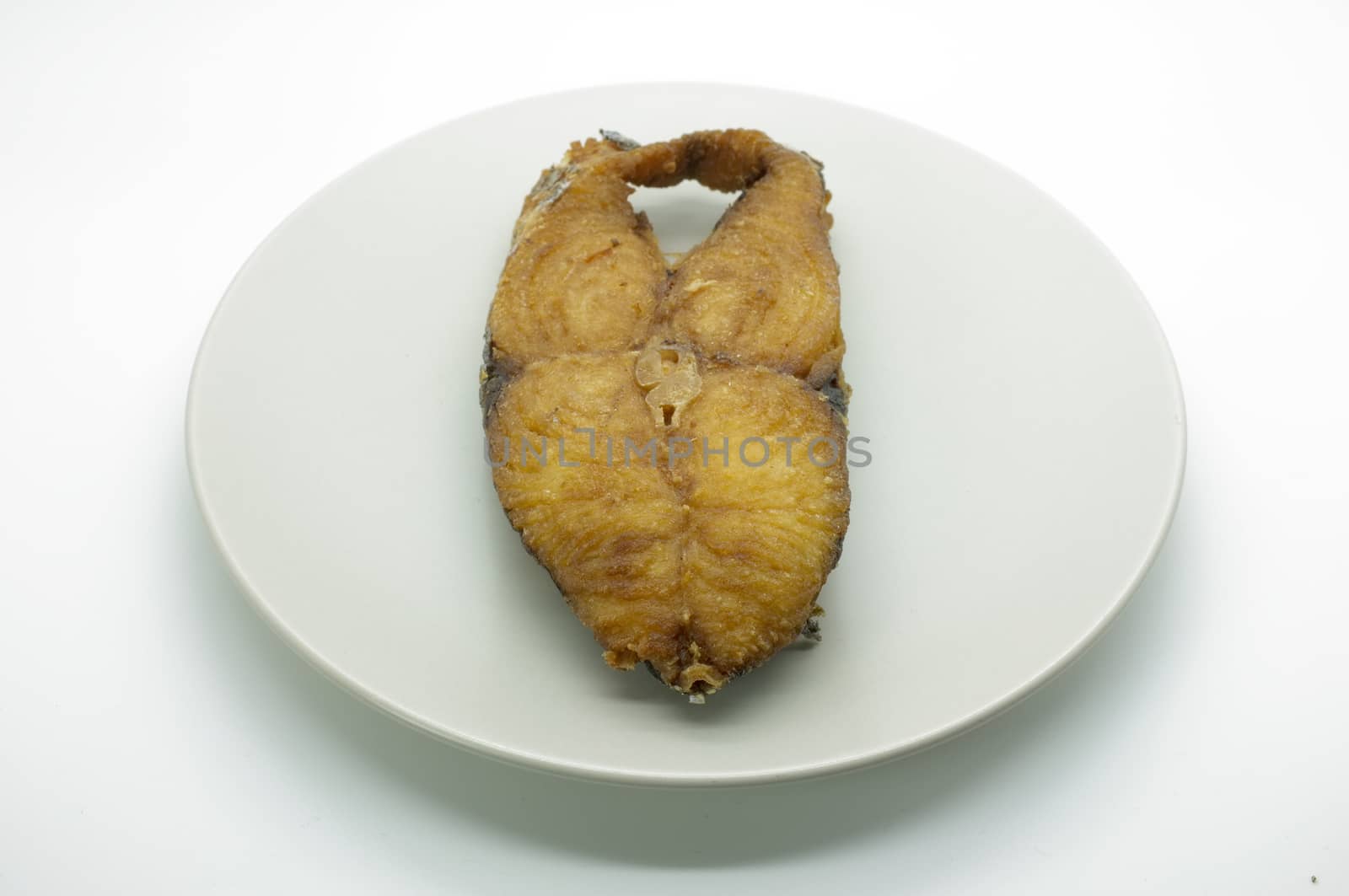 Deep fried fish on dish