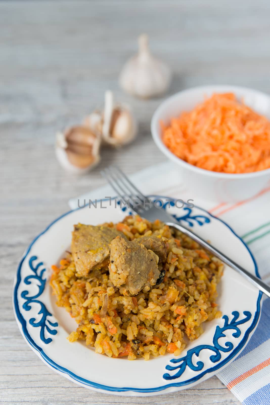 Plate of rice and meat dish pilau by Linaga