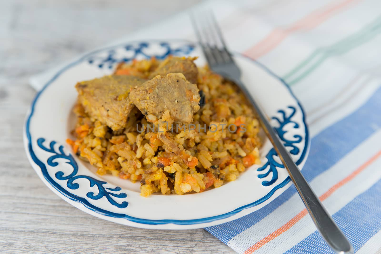 Plate of rice and meat dish pilau by Linaga