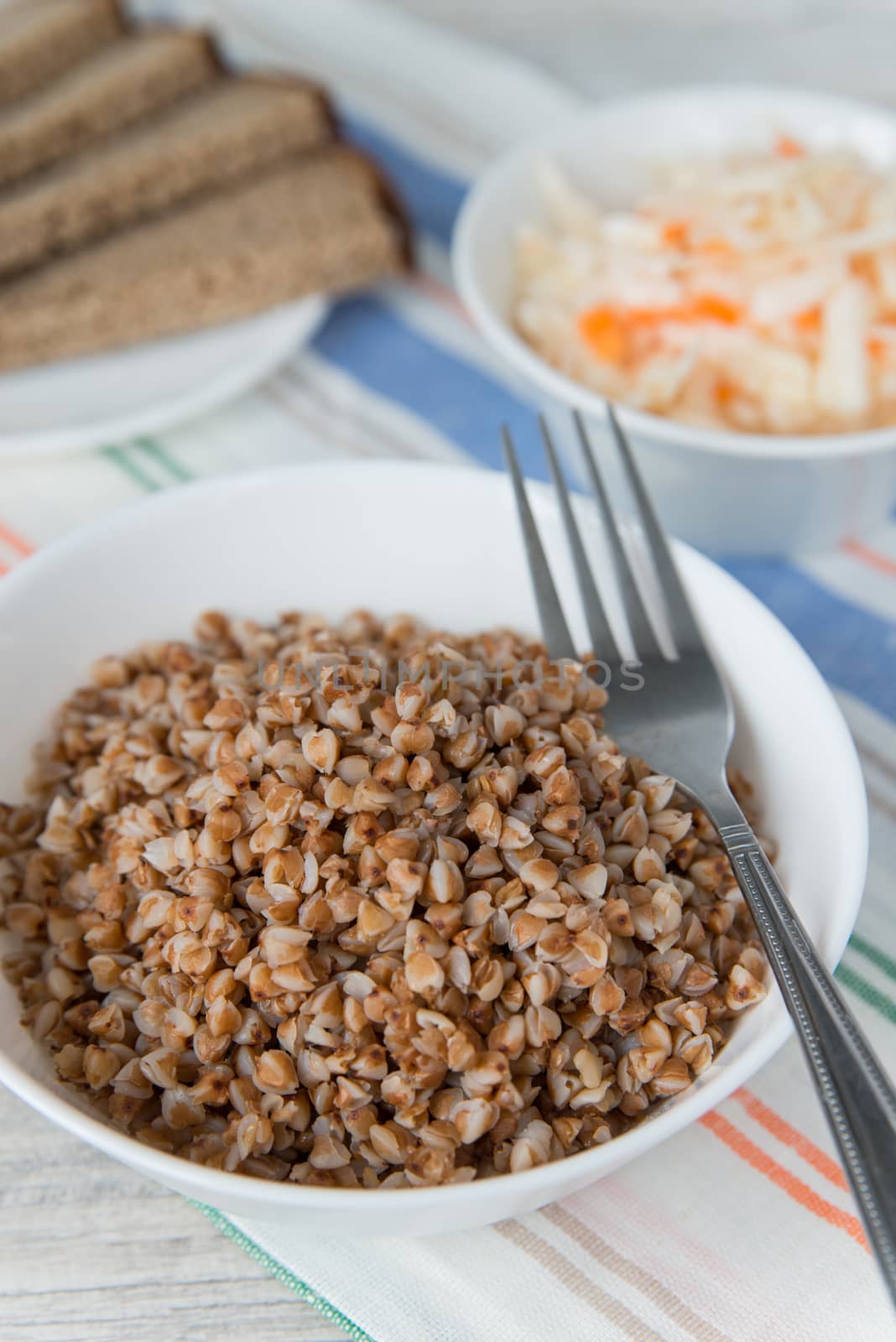 Dinner with the buckwheat cereals and sauerkraut