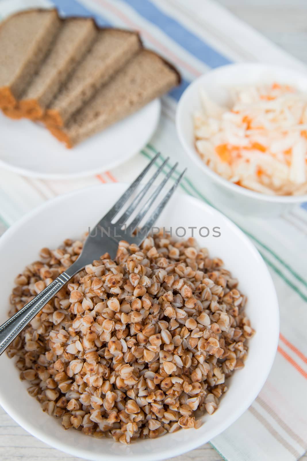 Dinner with the buckwheat cereals and sauerkraut