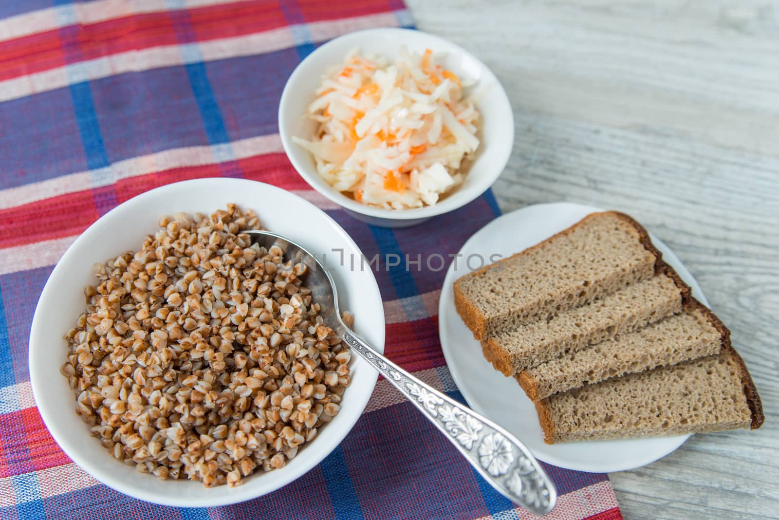Dinner with the buckwheat cereals and sauerkraut