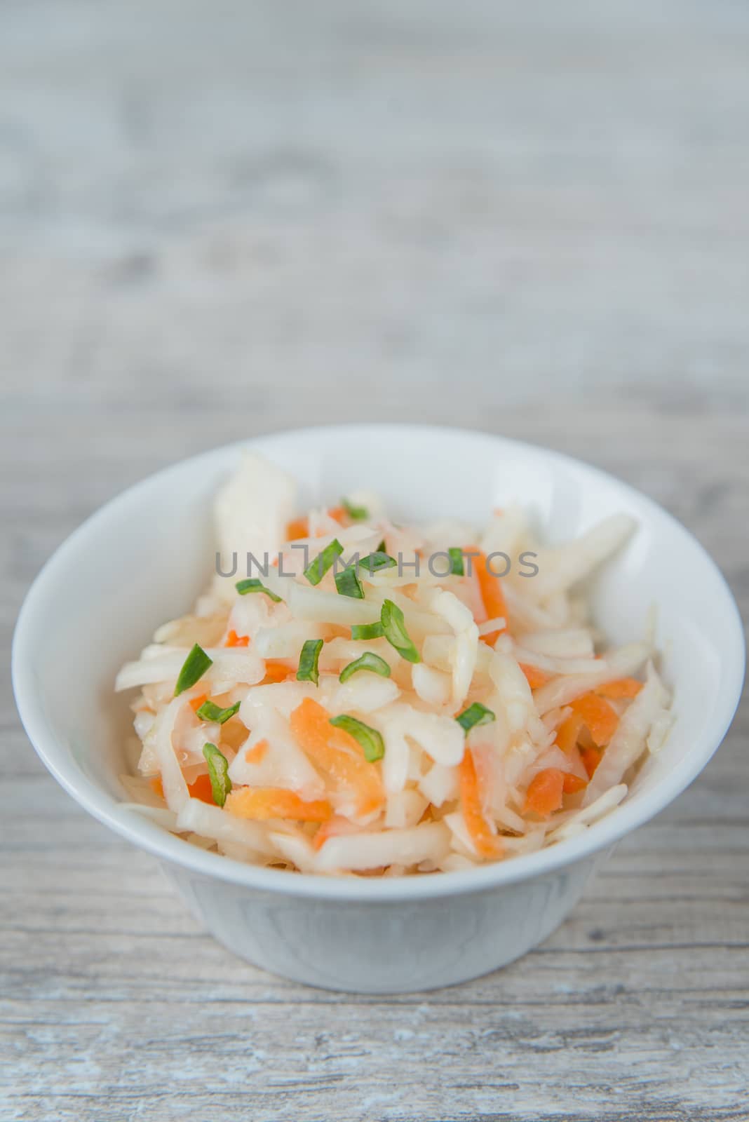 Plate of the sauerkraut with green onion