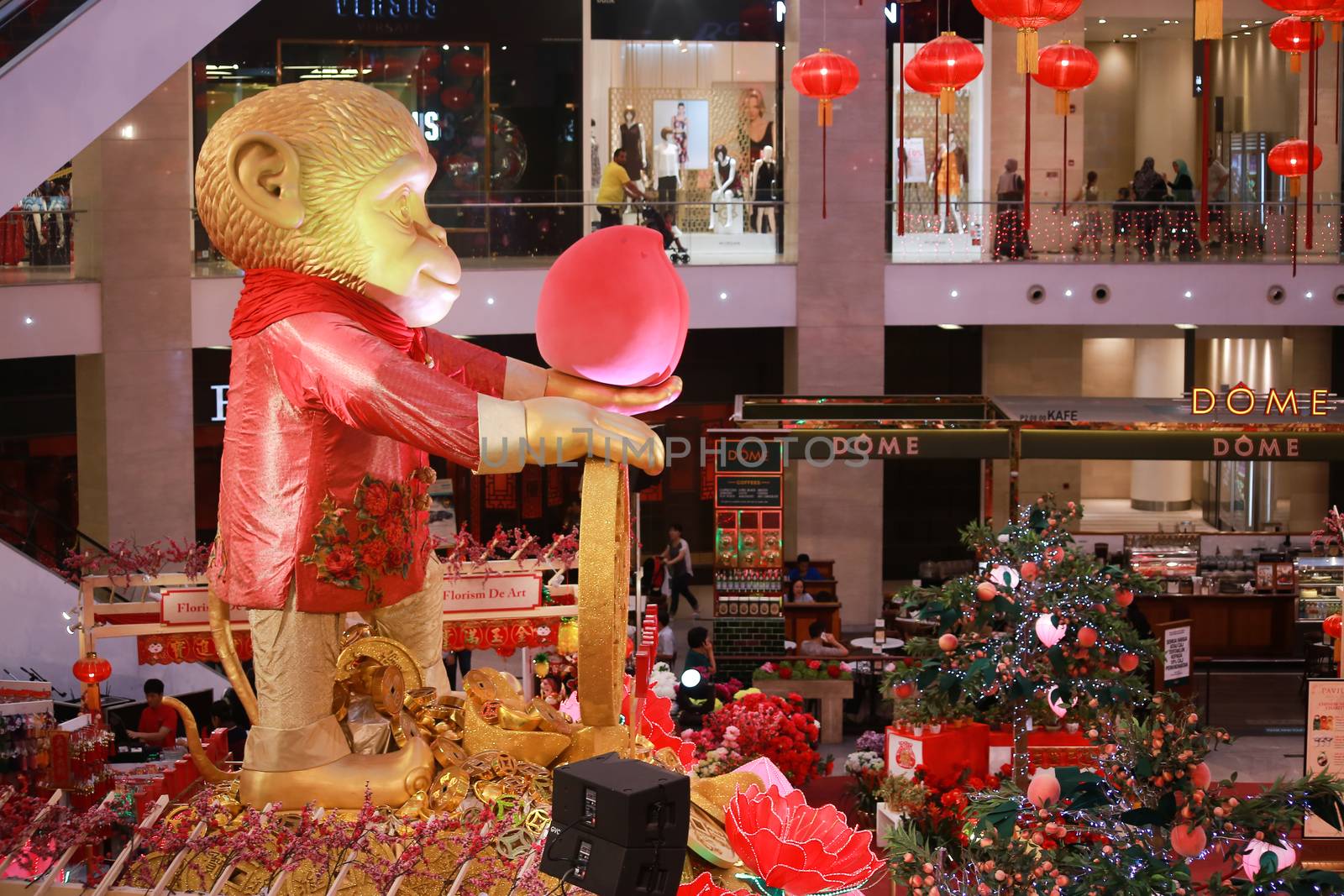 MALAYSIA, Kuala Lumpur: A picture is taken of the huge monkey installed in the middle of the Pavilion shopping centre in Kuala Lumpur, Malaysia for the Chinese Lunar New Year celebrations on January 29, 2016.  This year the Chinese New Year will be celebrated on February 8, 2016.  