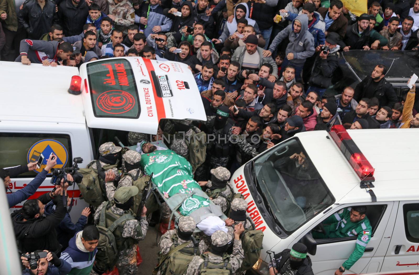 GAZA STRIP, Gaza City: Palestinian Hamas militants carry the body of one of the seven Hamas militants killed after a tunnel, built for fighting Israel, collapsed in the Gaza Strip, during their funeral in Gaza City on January 29, 2016.The Ezzedine Al-Qassam Brigades, Hamas's armed wing, said that four militants managed to escape after the collapse late on January 26 in the northeast of the strip.
