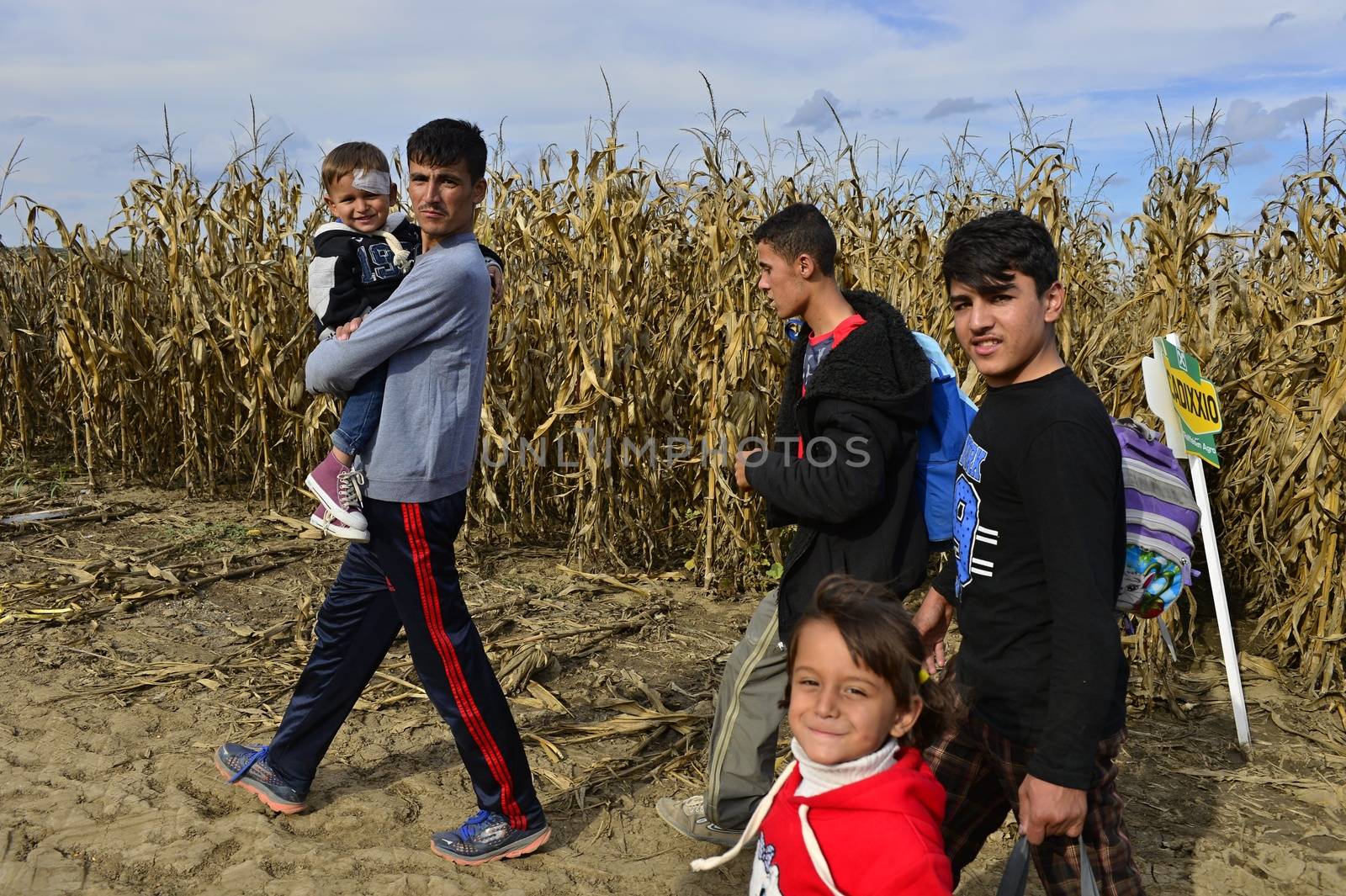 October 4, 2015; Sid in Serbia. Group of Afghan refugees leaving Serbia. They came to Sid by taxi and then they leaving Serbia and go to Croatia and then to Germany. Many of them escapes from home because of civil war. 