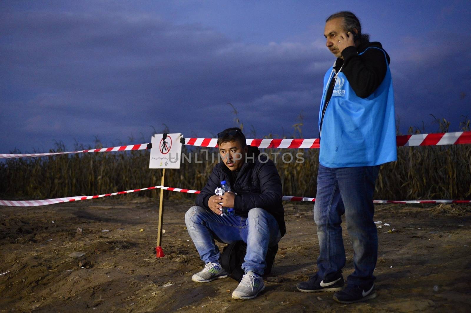 October 4, 2015; Bapska in Serbia. Group of refugees leaving Serbia. They came to Bapska by buses and then they leaving Serbia and go to Croatia and then to Germany. Many of them escapes from home because of civil war. 