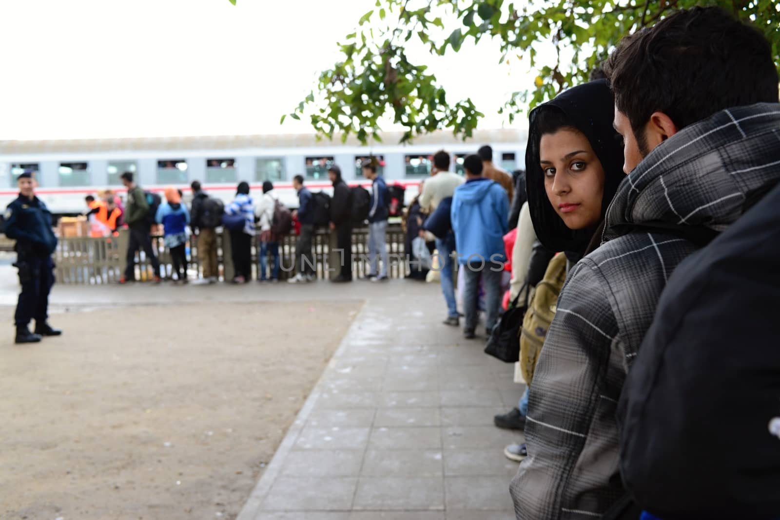 October 6,2015; Hegyeshalom in Hungary. Group of refugees leaving Hungary. They came to Hegyeshalom by train and then they leaving Hungary and go to Austria and then to Germany. Many of them escapes from home because of civil war. 
