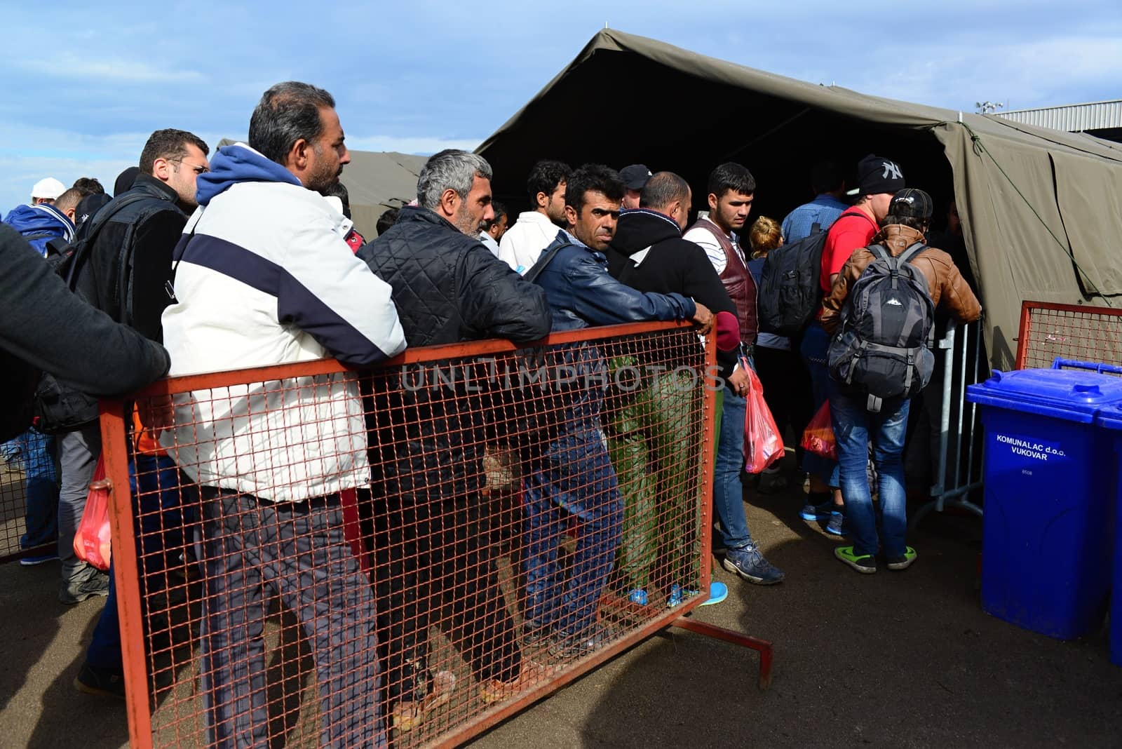 October 6,2015; Hegyeshalom in Hungary. Group of refugees leaving Hungary. They came to Hegyeshalom by train and then they leaving Hungary and go to Austria and then to Germany. Many of them escapes from home because of civil war. 