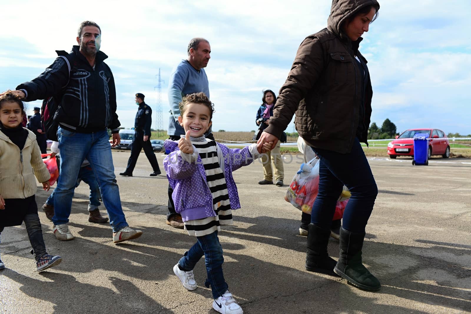 October 6,2015; Hegyeshalom in Hungary. Group of refugees leaving Hungary. They came to Hegyeshalom by train and then they leaving Hungary and go to Austria and then to Germany. Many of them escapes from home because of civil war. 