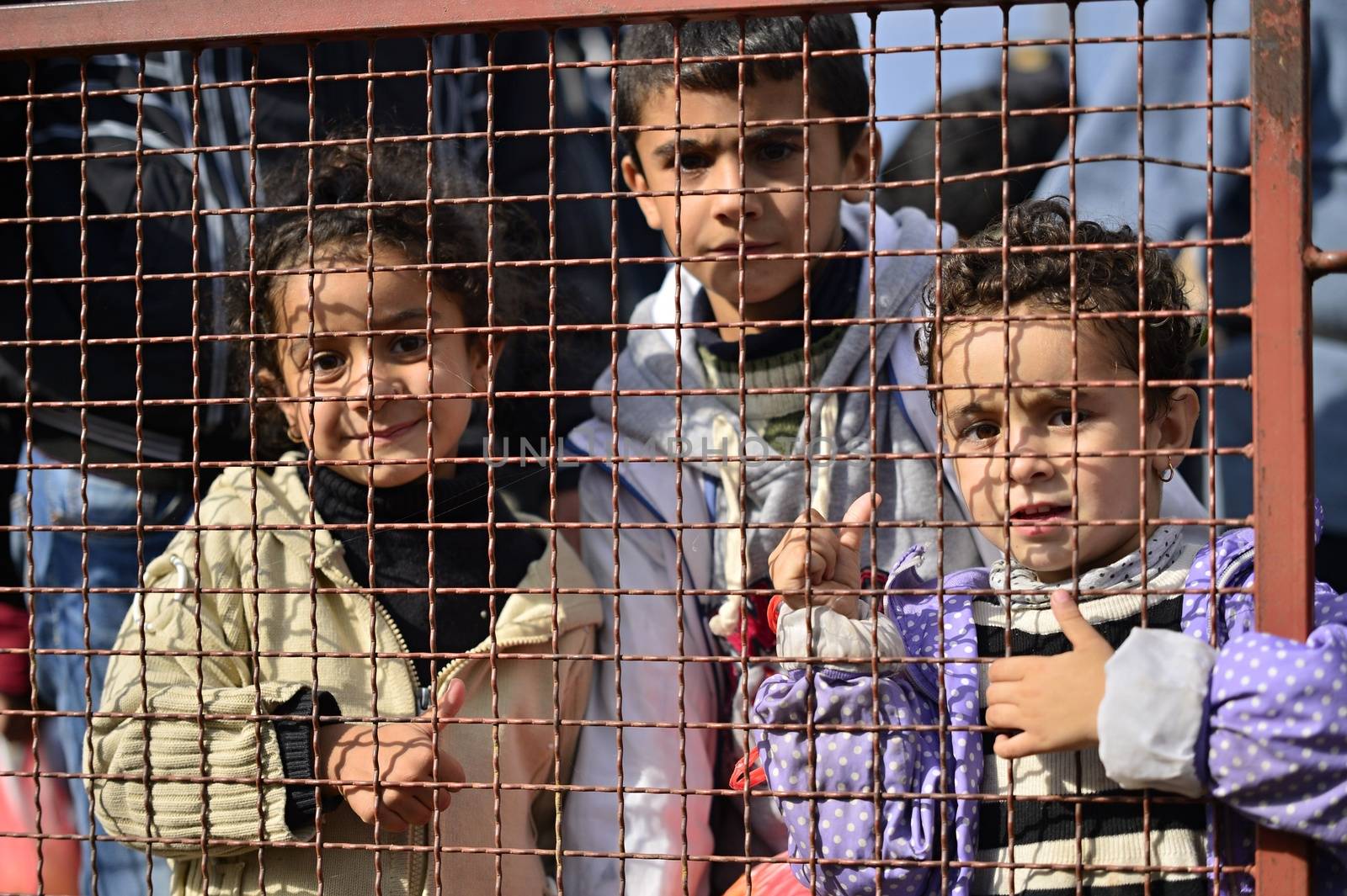 October 5, 2015; Tovarnik in Croatia. Croatian police assist refugees get into train which will go to Hungary.