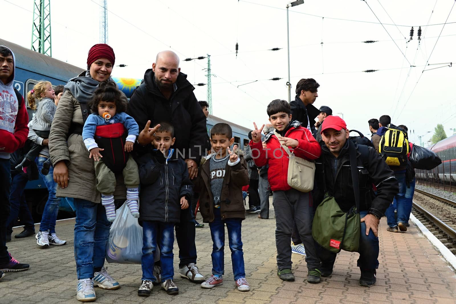 October 6,2015; Hegyeshalom in Hungary. Group of refugees leaving Hungary. They came to Hegyeshalom by train and then they leaving Hungary and go to Austria and then to Germany. Many of them escapes from home because of civil war. 