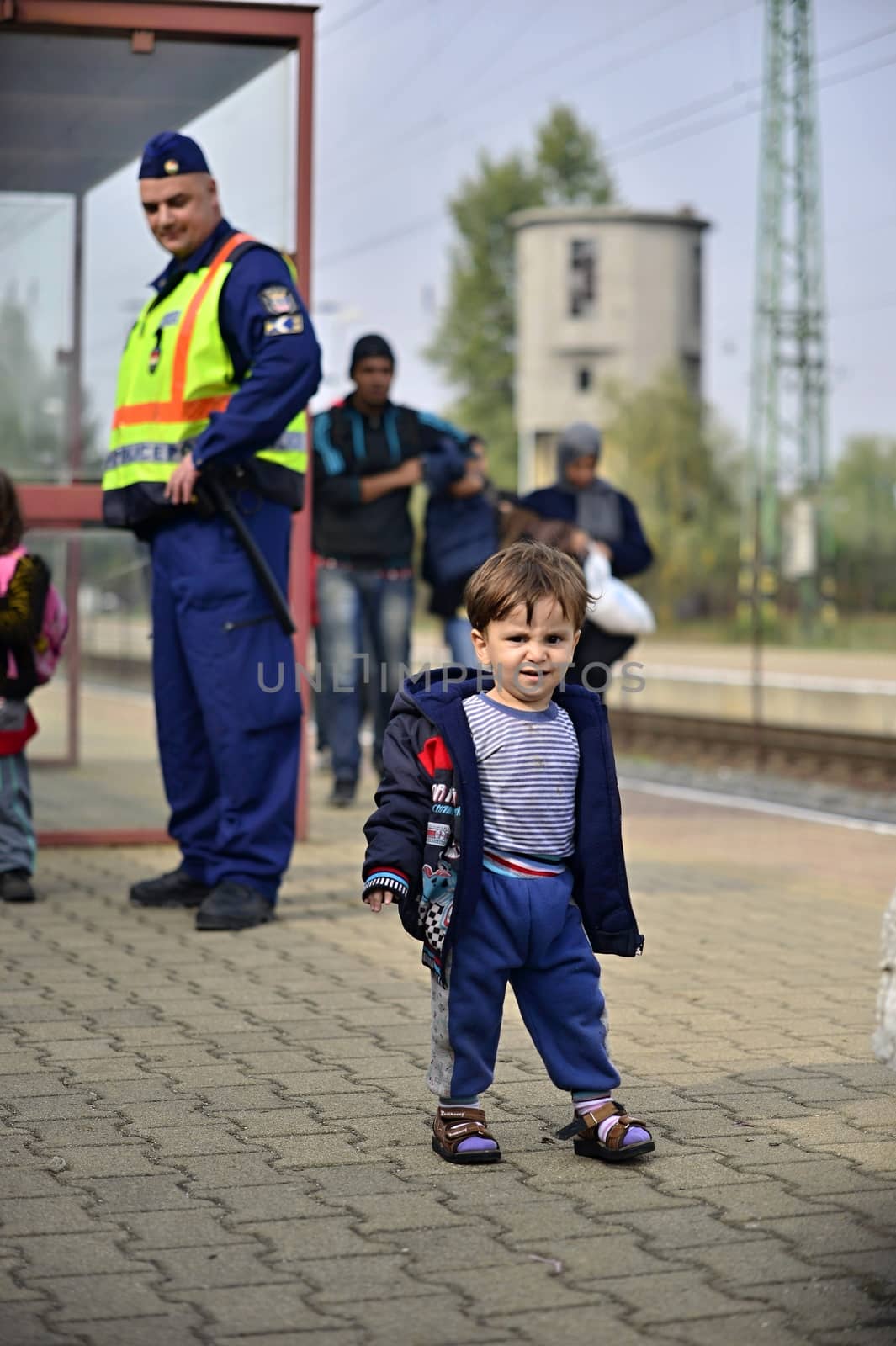 October 6,2015; Hegyeshalom in Hungary. Group of refugees leaving Hungary. They came to Hegyeshalom by train and then they leaving Hungary and go to Austria and then to Germany. Many of them escapes from home because of civil war. 