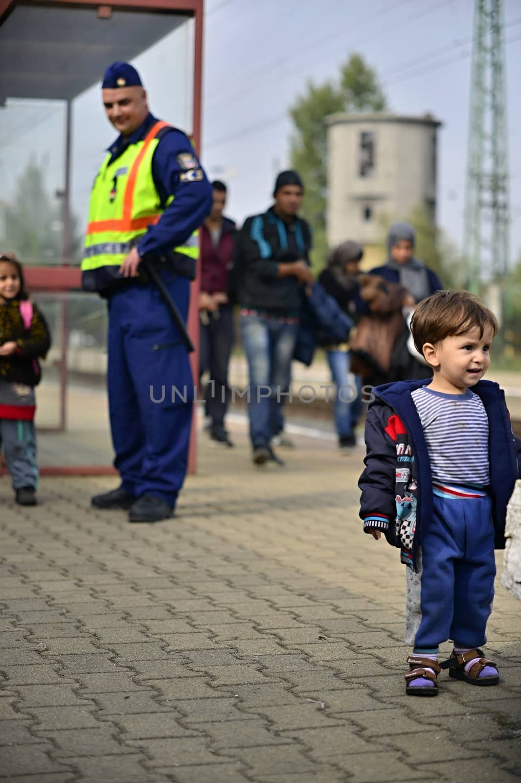 October 6,2015; Hegyeshalom in Hungary. Group of refugees leaving Hungary. They came to Hegyeshalom by train and then they leaving Hungary and go to Austria and then to Germany. Many of them escapes from home because of civil war. 