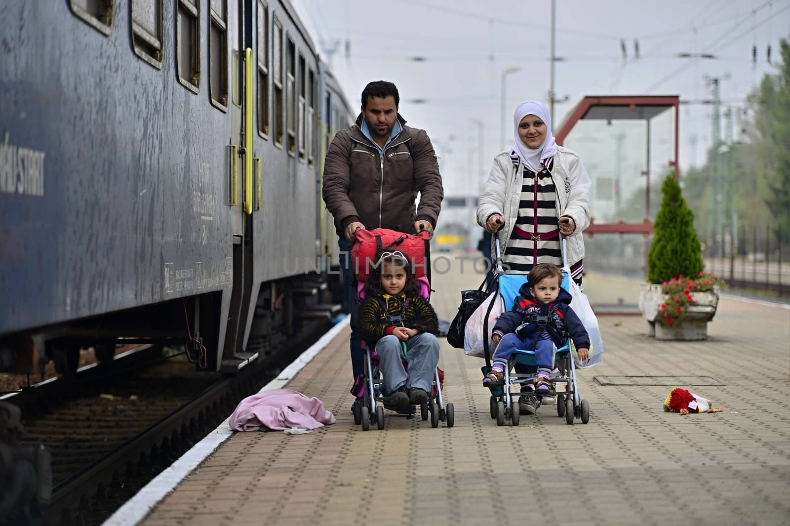 October 6,2015; Hegyeshalom in Hungary. Group of refugees leaving Hungary. They came to Hegyeshalom by train and then they leaving Hungary and go to Austria and then to Germany. Many of them escapes from home because of civil war. 