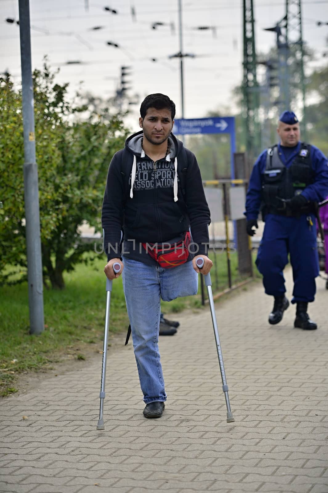 October 6,2015; Hegyeshalom in Hungary. Group of refugees leaving Hungary. They came to Hegyeshalom by train and then they leaving Hungary and go to Austria and then to Germany. Many of them escapes from home because of civil war. 