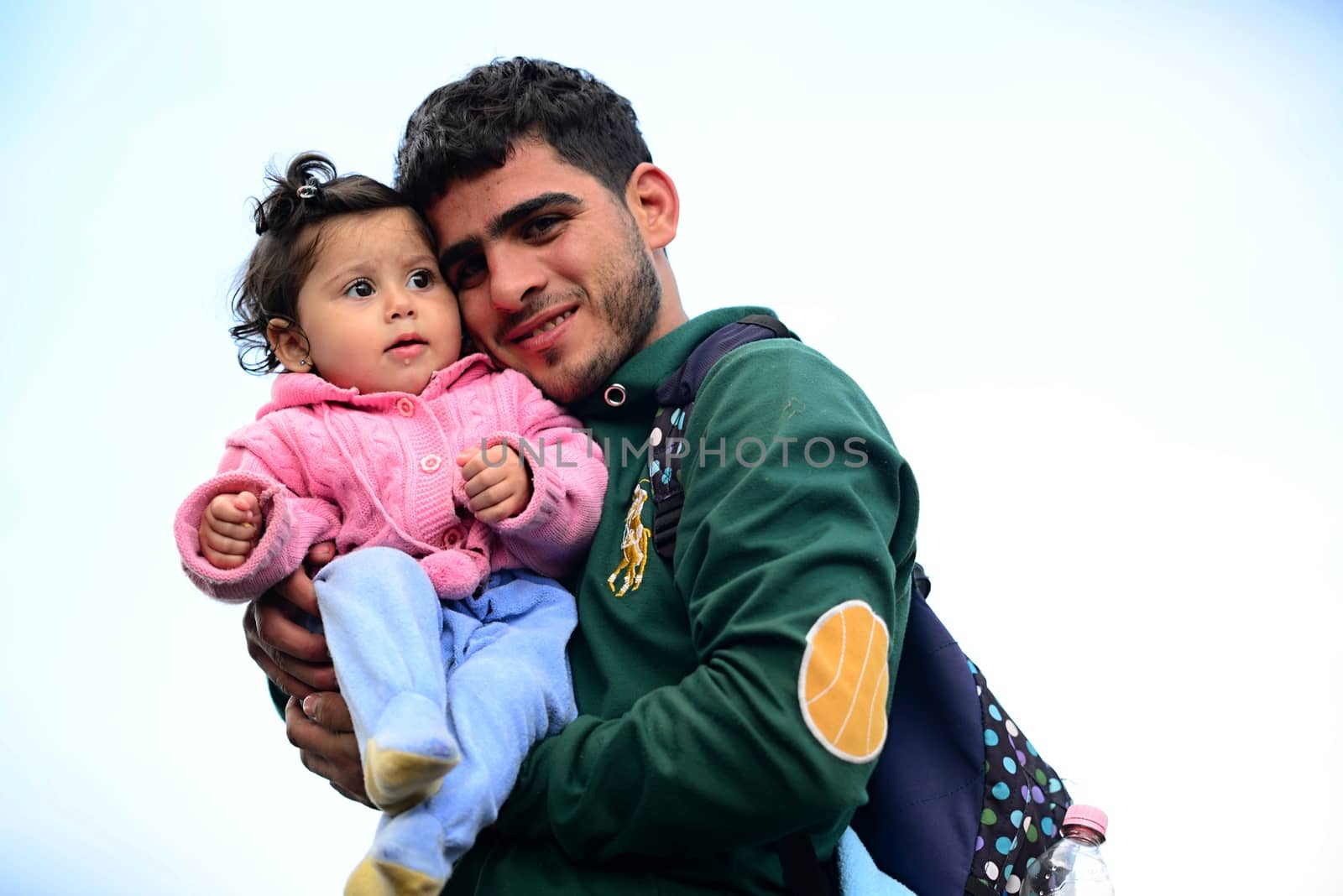 October 6,2015; Hegyeshalom in Hungary. Group of refugees leaving Hungary. They came to Hegyeshalom by train and then they leaving Hungary and go to Austria and then to Germany. Many of them escapes from home because of civil war. 