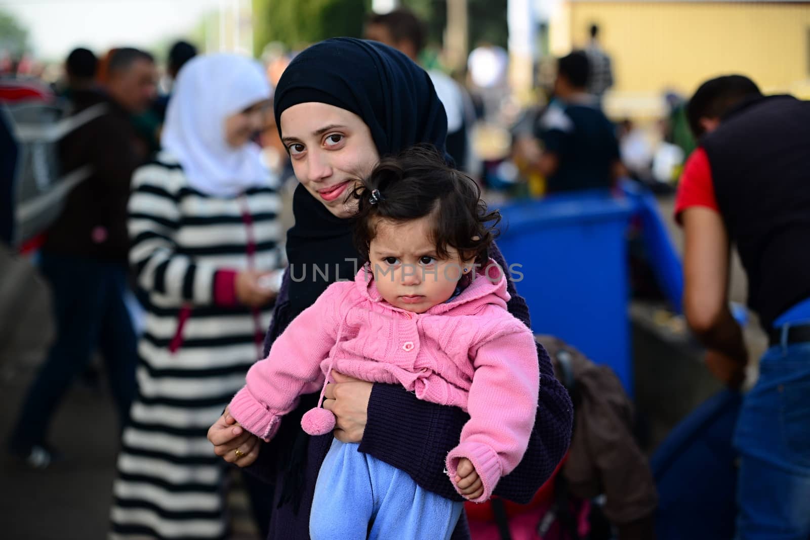 October 6,2015; Hegyeshalom in Hungary. Group of refugees leaving Hungary. They came to Hegyeshalom by train and then they leaving Hungary and go to Austria and then to Germany. Many of them escapes from home because of civil war. 