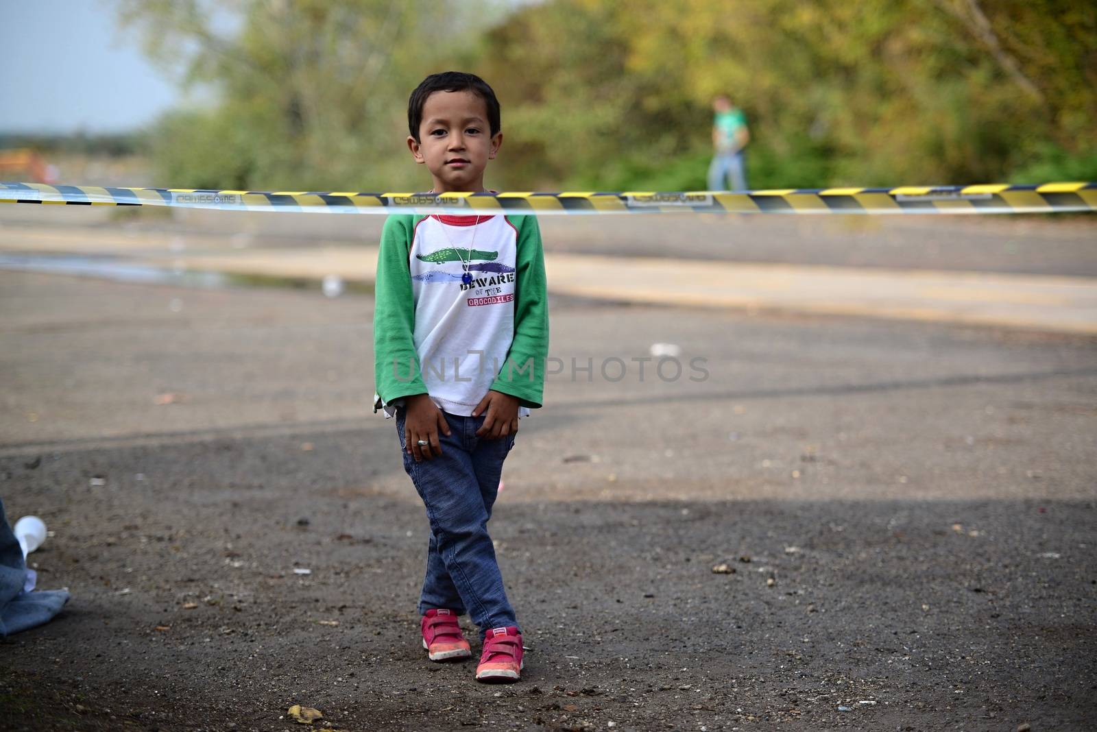October 6,2015; Hegyeshalom in Hungary. Group of refugees leaving Hungary. They came to Hegyeshalom by train and then they leaving Hungary and go to Austria and then to Germany. Many of them escapes from home because of civil war. 