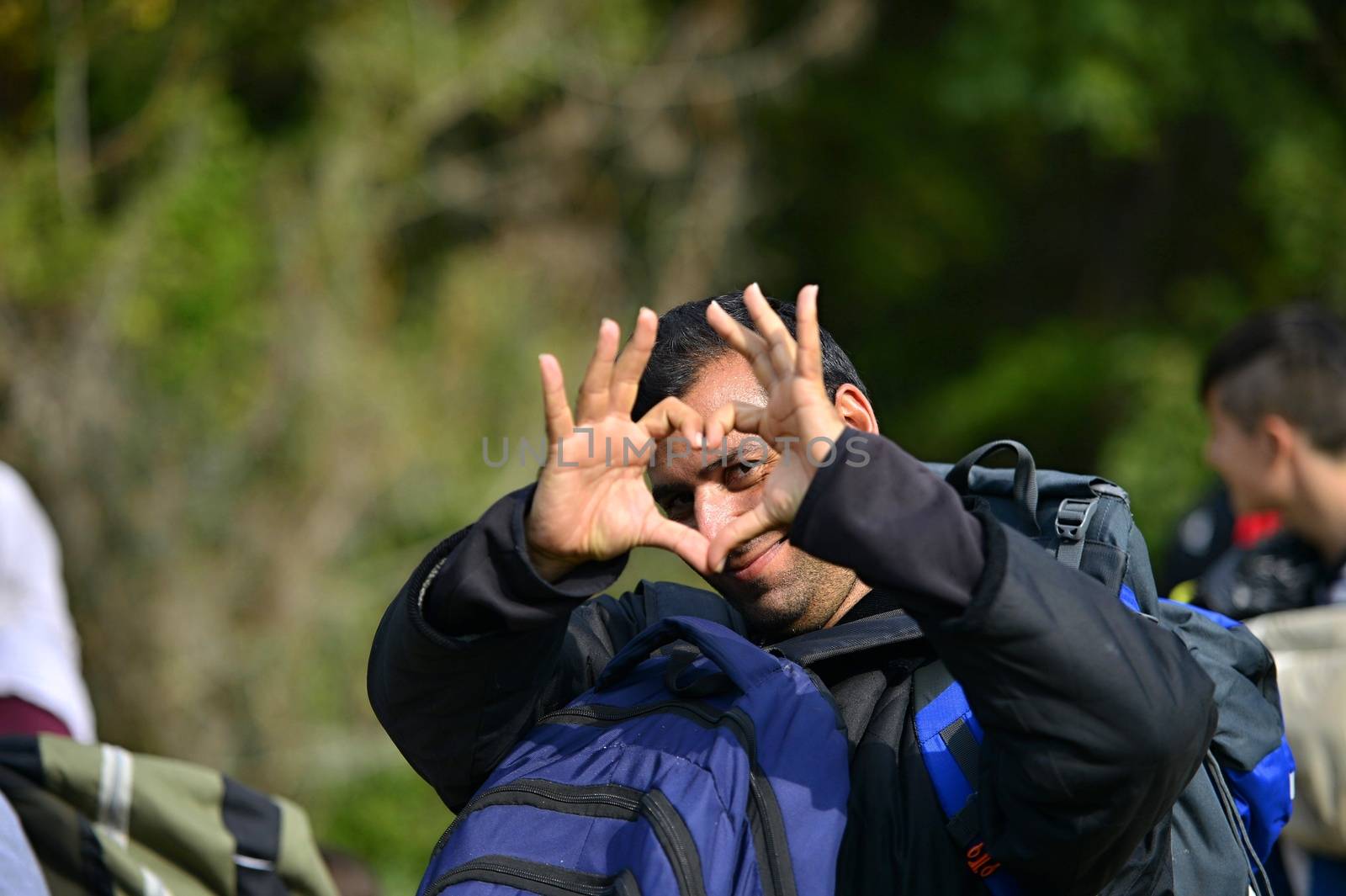 October 6,2015; Hegyeshalom in Hungary. Group of refugees leaving Hungary. They came to Hegyeshalom by train and then they leaving Hungary and go to Austria and then to Germany. Many of them escapes from home because of civil war. 
