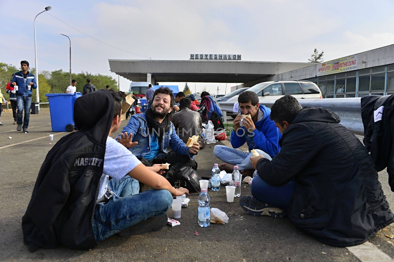 October 6,2015; Hegyeshalom in Hungary. Group of refugees leaving Hungary. They came to Hegyeshalom by train and then they leaving Hungary and go to Austria and then to Germany. Many of them escapes from home because of civil war. 