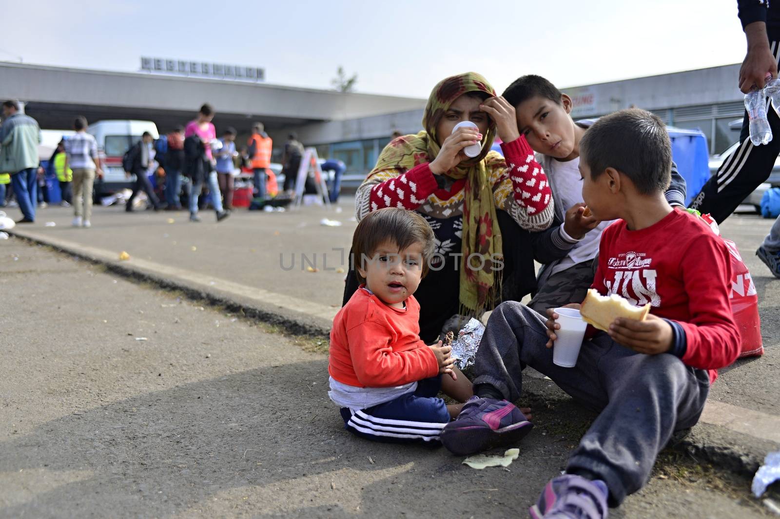 October 6,2015; Hegyeshalom in Hungary. Group of refugees leaving Hungary. They came to Hegyeshalom by train and then they leaving Hungary and go to Austria and then to Germany. Many of them escapes from home because of civil war. 