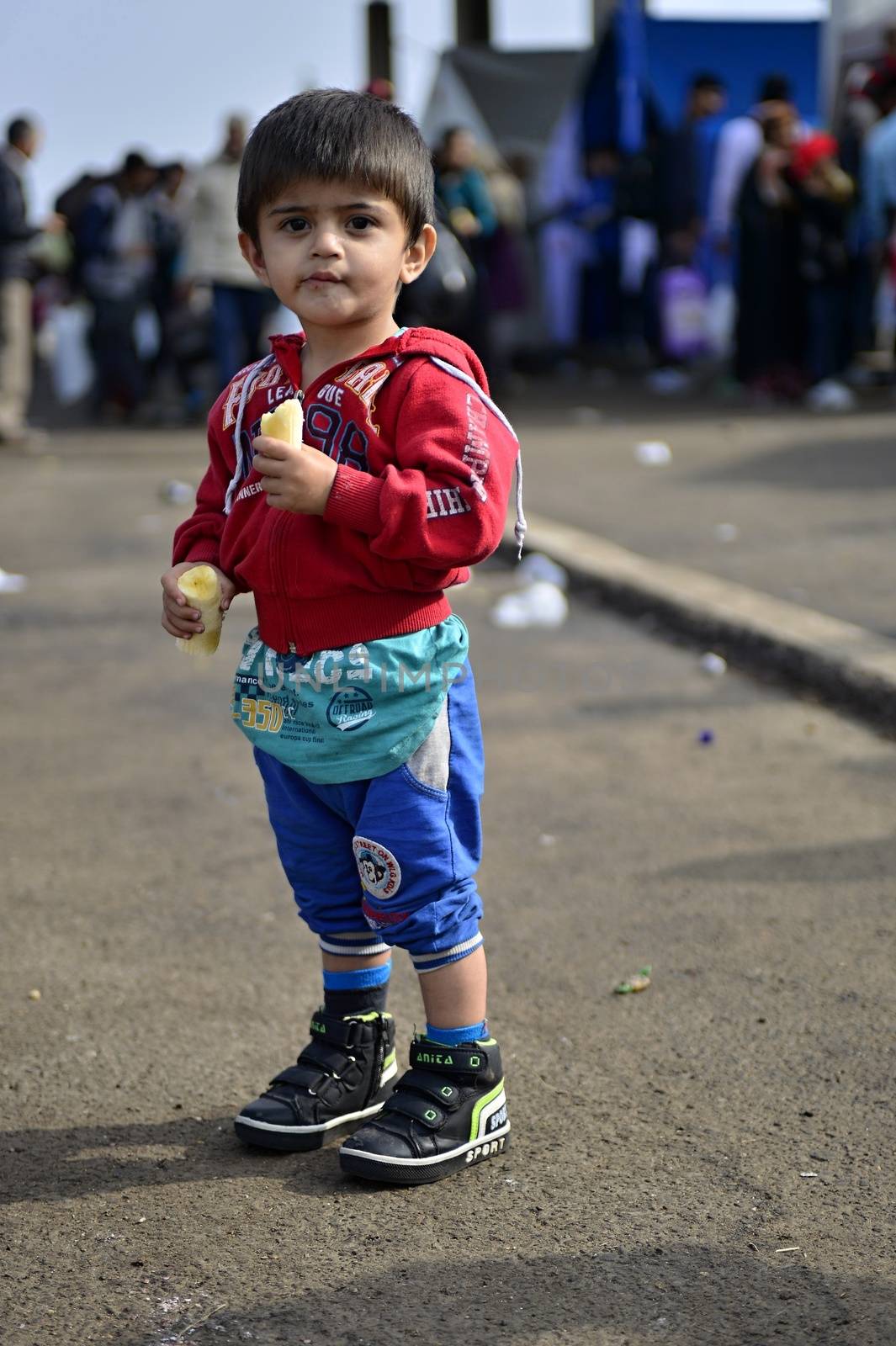 October 6,2015; Hegyeshalom in Hungary. Group of refugees leaving Hungary. They came to Hegyeshalom by train and then they leaving Hungary and go to Austria and then to Germany. Many of them escapes from home because of civil war. 