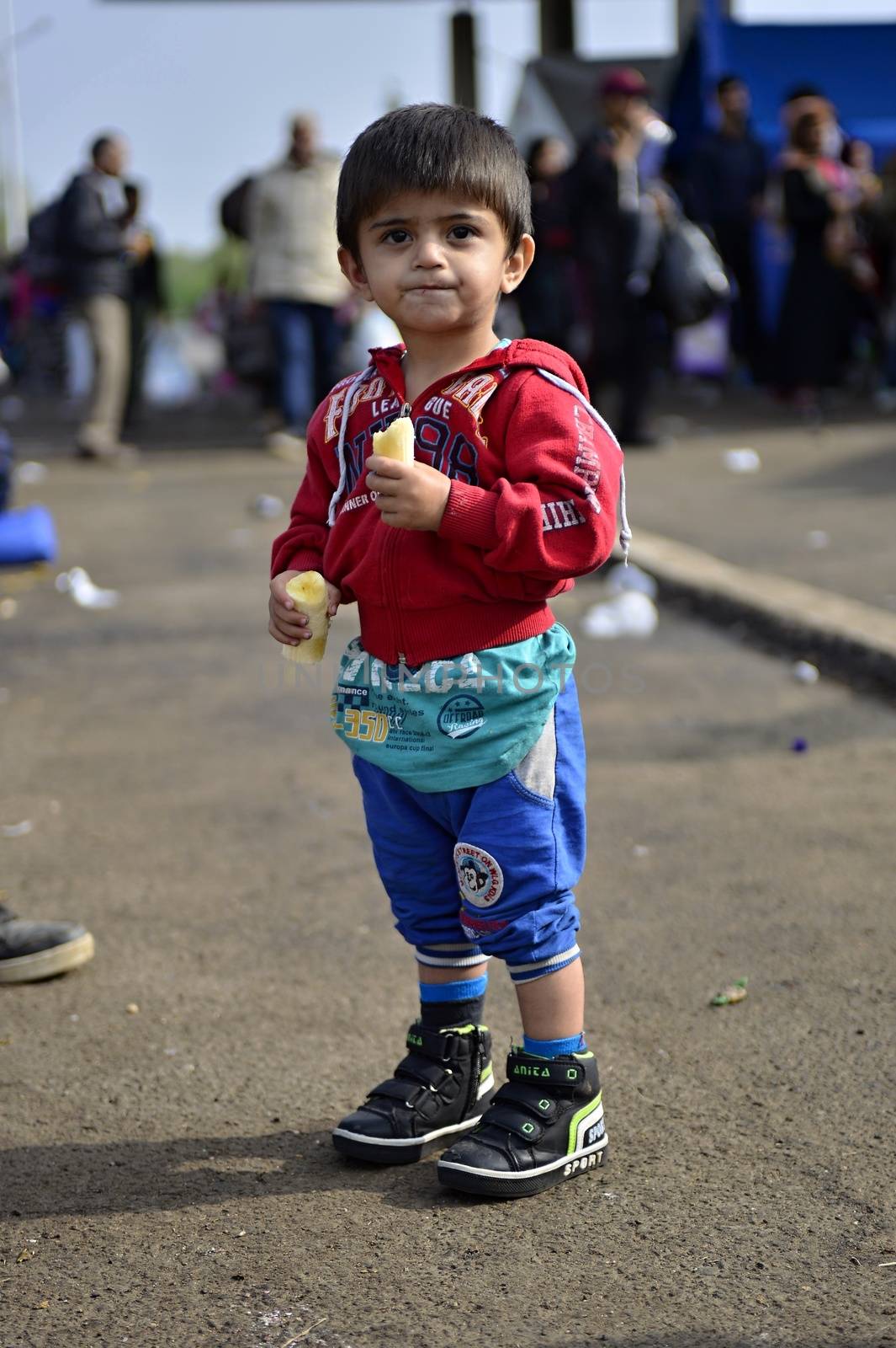 October 6,2015; Hegyeshalom in Hungary. Group of refugees leaving Hungary. They came to Hegyeshalom by train and then they leaving Hungary and go to Austria and then to Germany. Many of them escapes from home because of civil war. 