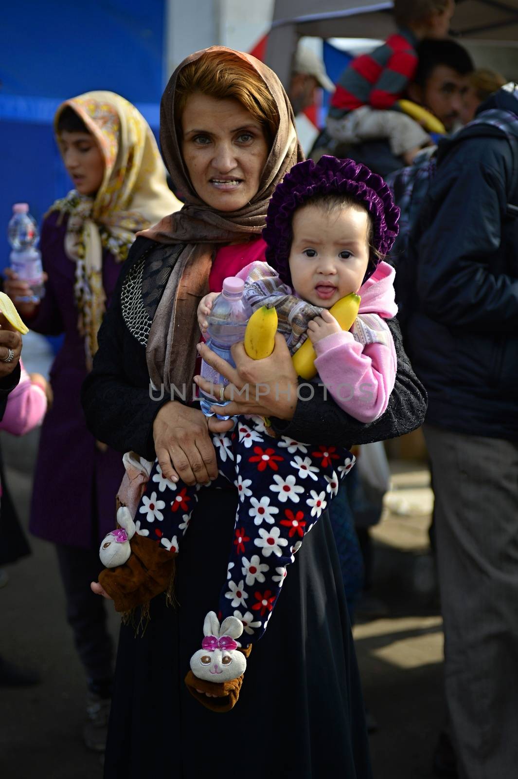 October 6,2015; Hegyeshalom in Hungary. Group of refugees leaving Hungary. They came to Hegyeshalom by train and then they leaving Hungary and go to Austria and then to Germany. Many of them escapes from home because of civil war. 