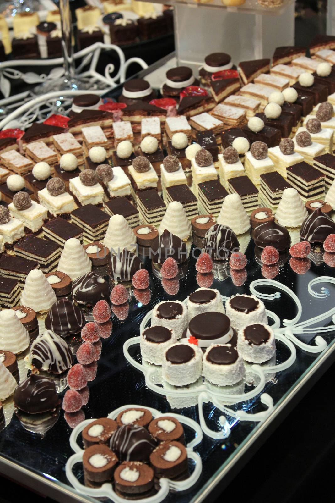 Colorful desserts and pastry served on a wedding party