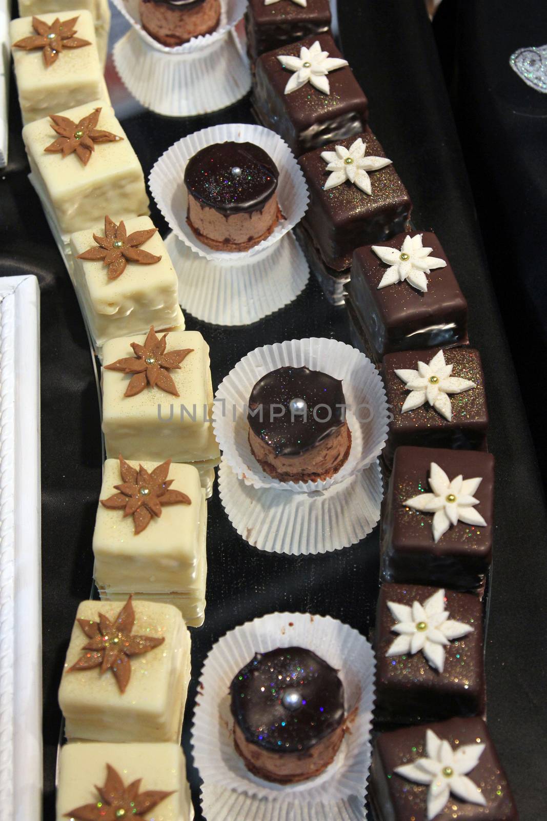 Colorful desserts and pastry served on a wedding party