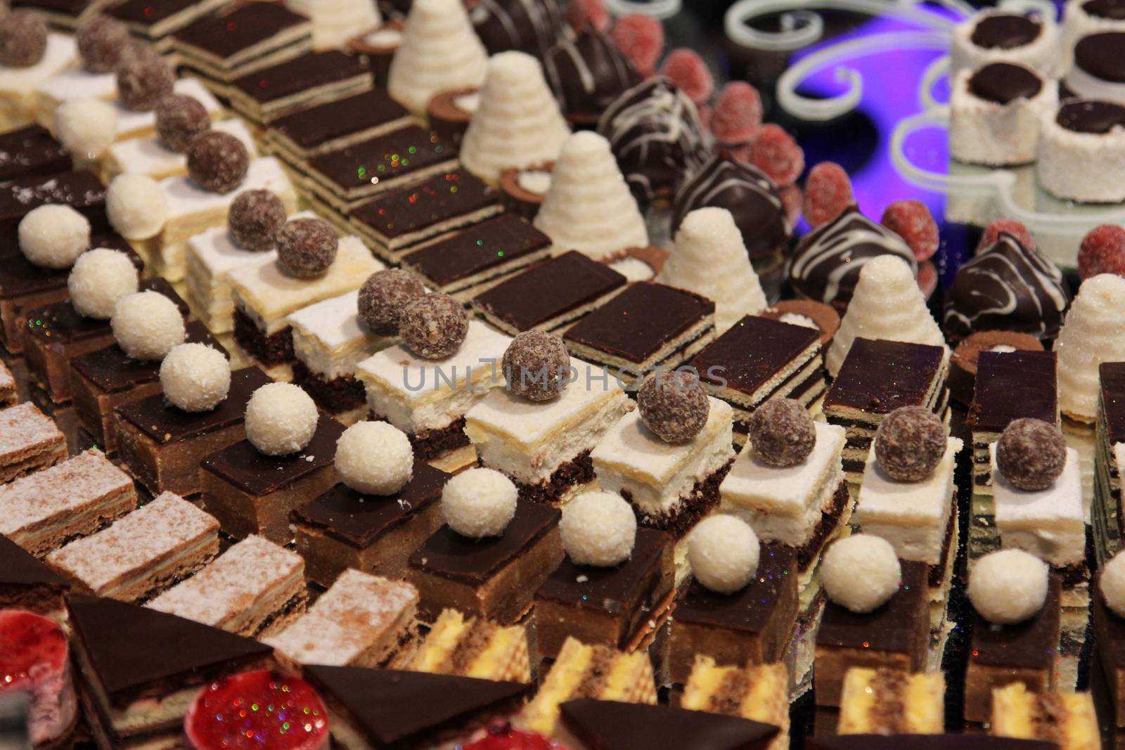 Colorful desserts and pastry served on a wedding party