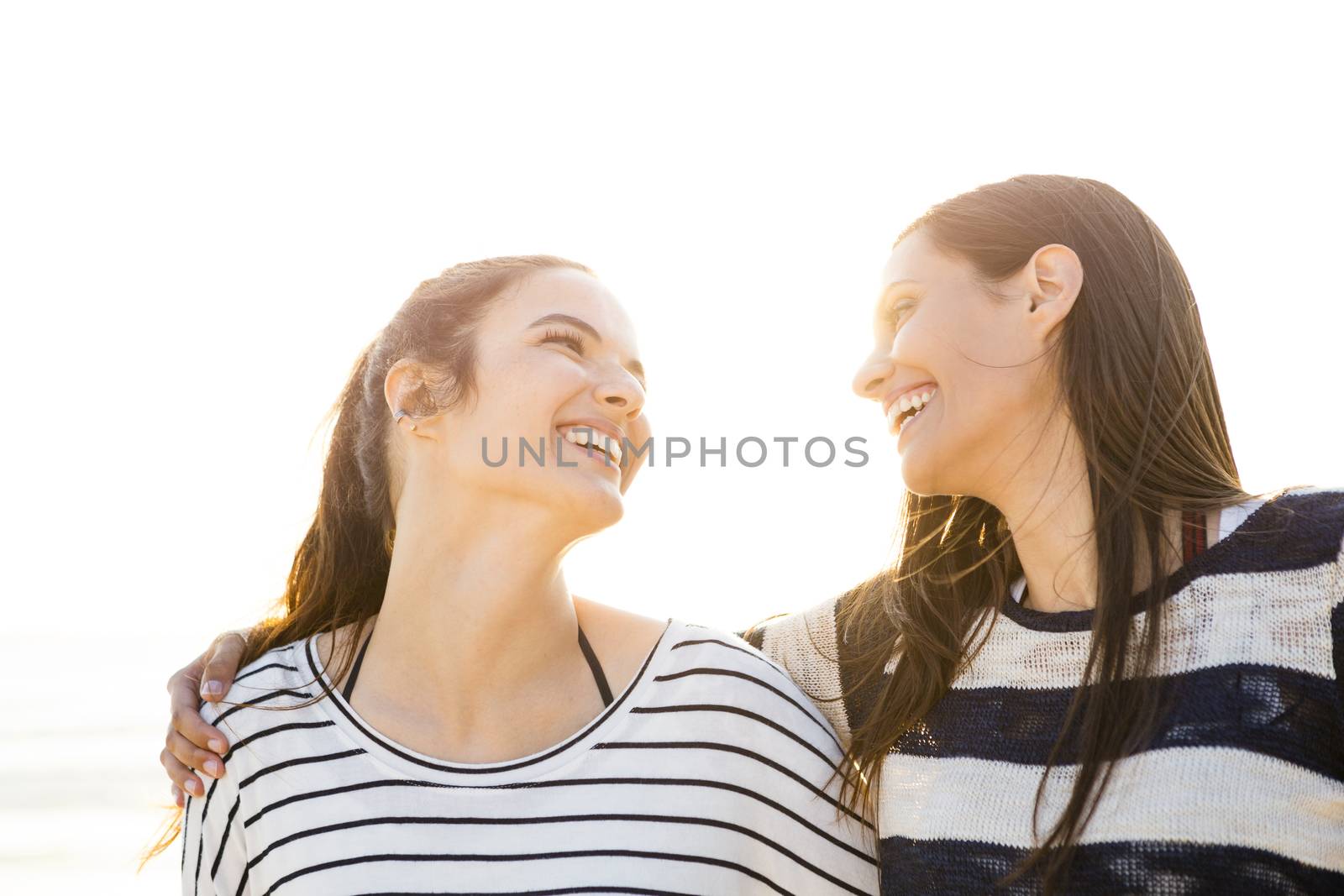 A portrait of best friends laughing 