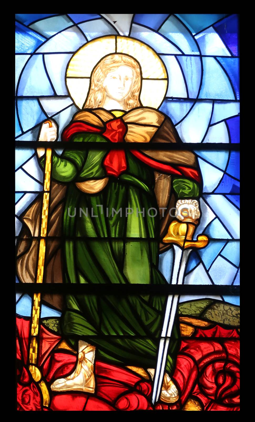 Saint Michael stained glass window in the Church of the Holy Sacrament in Portoferraio, Elba, Italy on May 03, 2014 Portoferraio, Italy
