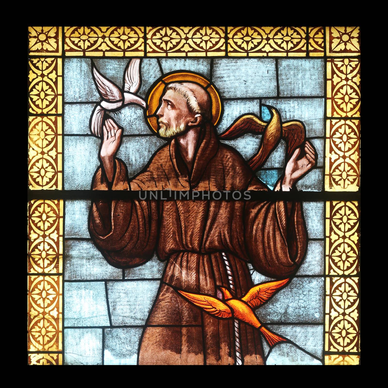 Saint Francis of Assi, stained glass window in the church of St. James the Greater in Porto Azzurro, Elba, Italy