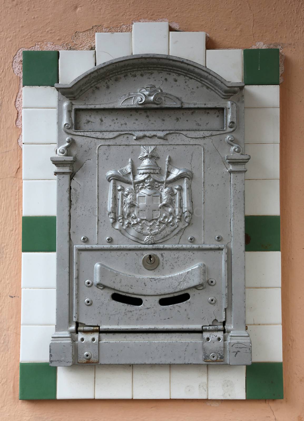 Beautiful old mailbox hanging on the wall