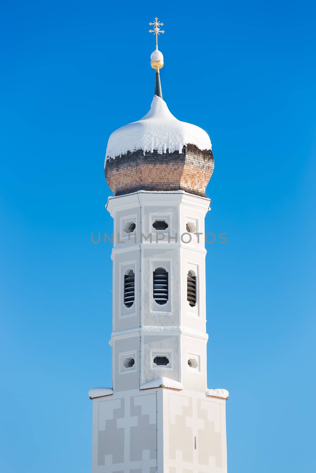 Bell tower of Bavarian Church, German Alps by fisfra