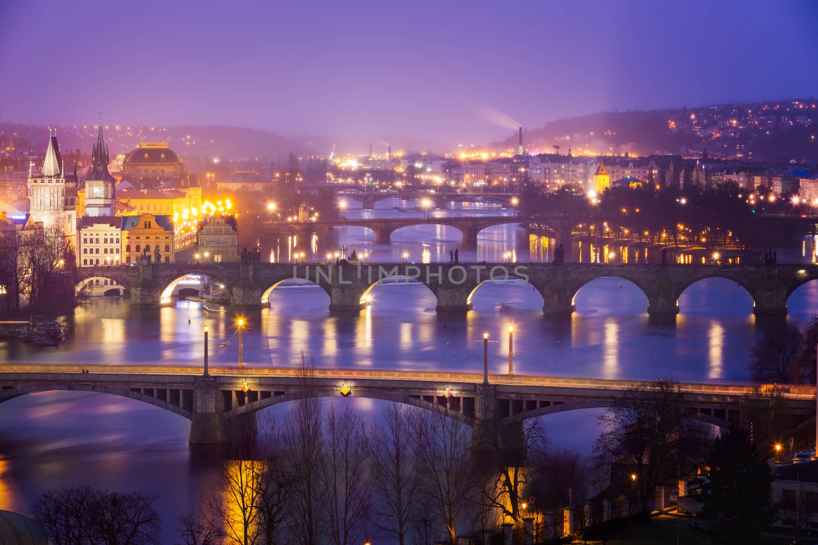 Vltava (Moldau) River at Prague with Charles Bridge at dusk, Czech Republic