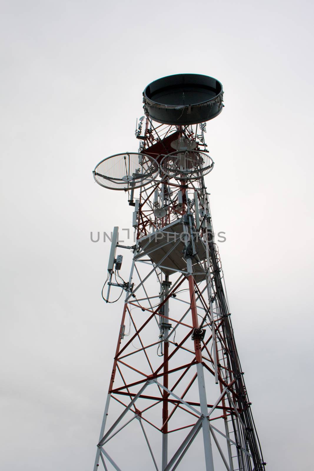 Telecommunication tower blue sky background,Phone antenna by N_u_T