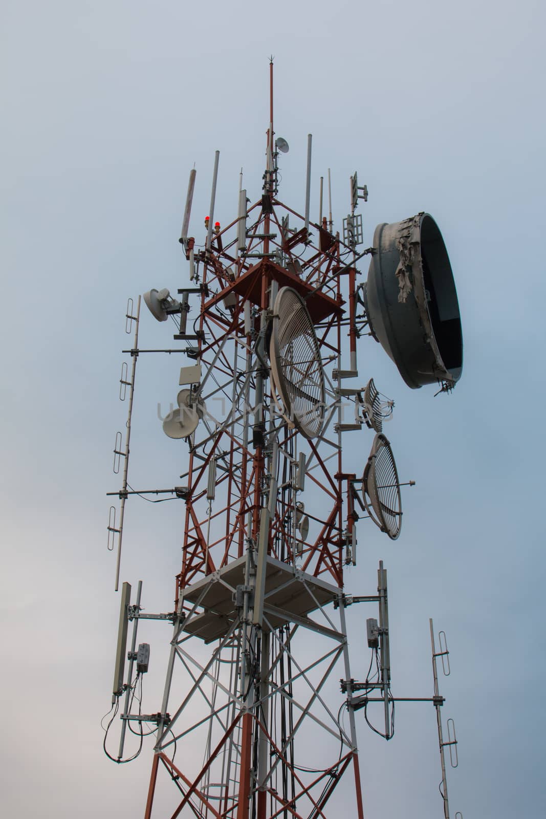 Telecommunication tower blue sky background,Phone antenna