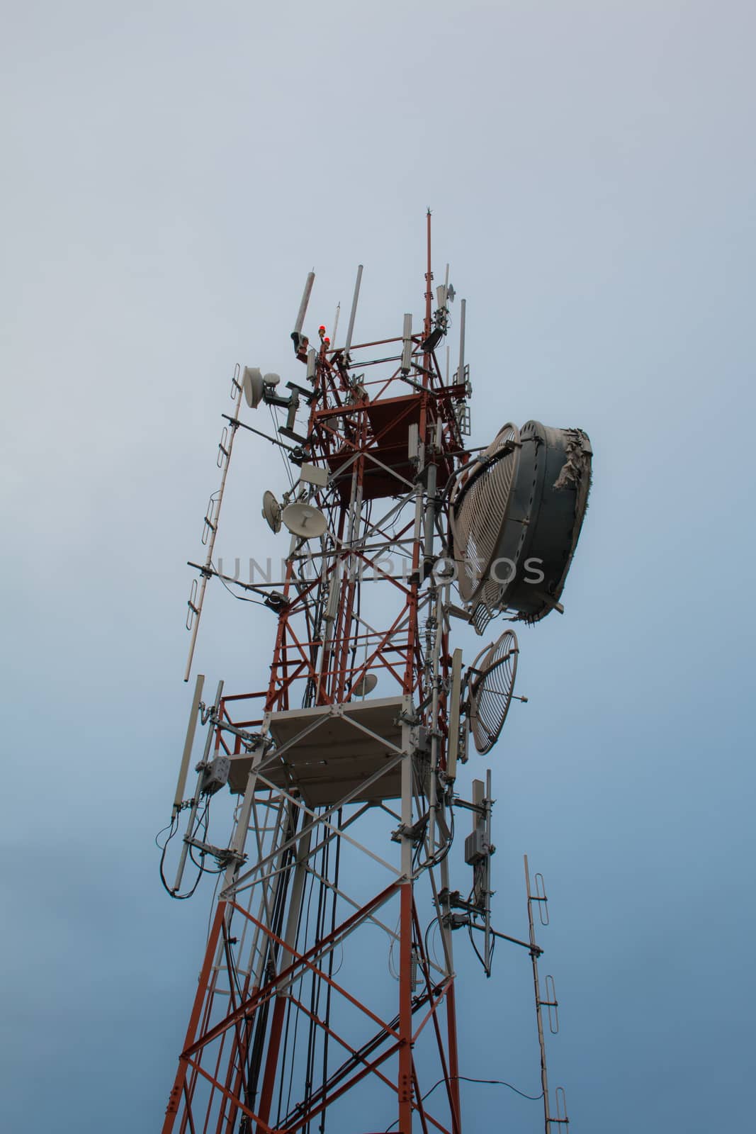 Telecommunication tower blue sky background,Phone antenna